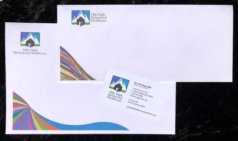 Branded stationery set for Mile High Behavioral Healthcare with envelopes and card.